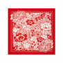 A square silk scarf with a red floral pattern.